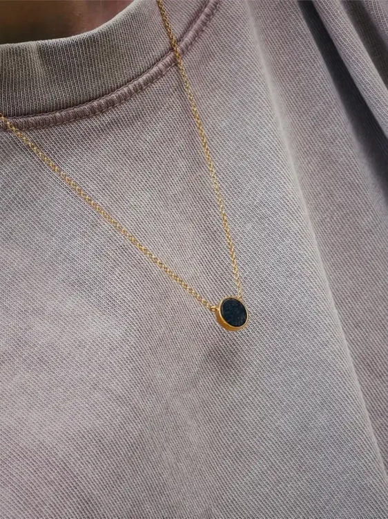 Minimalist necklace with dark stone