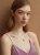 14k gold amber necklace worn on the neck