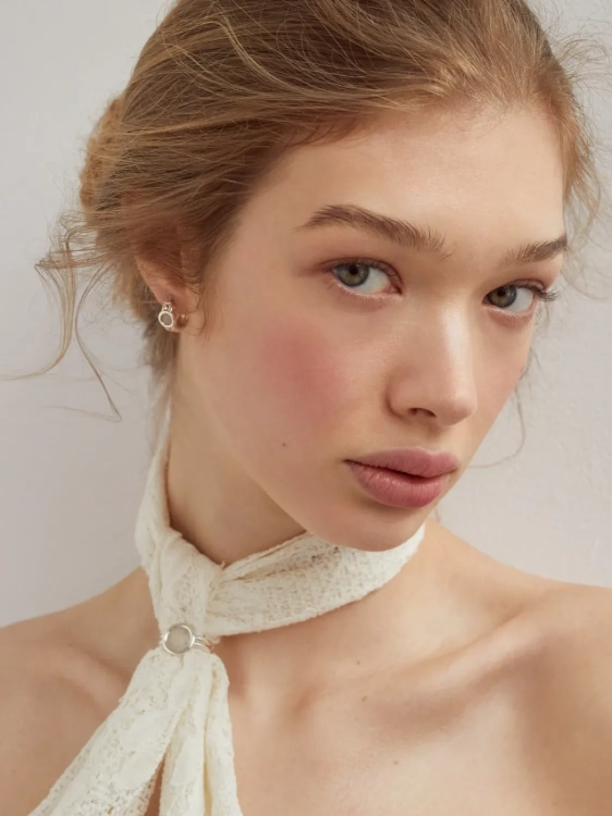 Sterling silver hoop earrings with mountain crystal as a minimalist accent