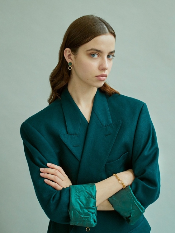Modern clip-on earrings with nephrite jade in an asymmetrical design