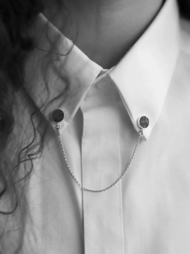 ling silver collar pin with loellingite stone and chain detail