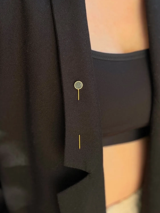 Minimalist gold pin with green stone for blazer or coat