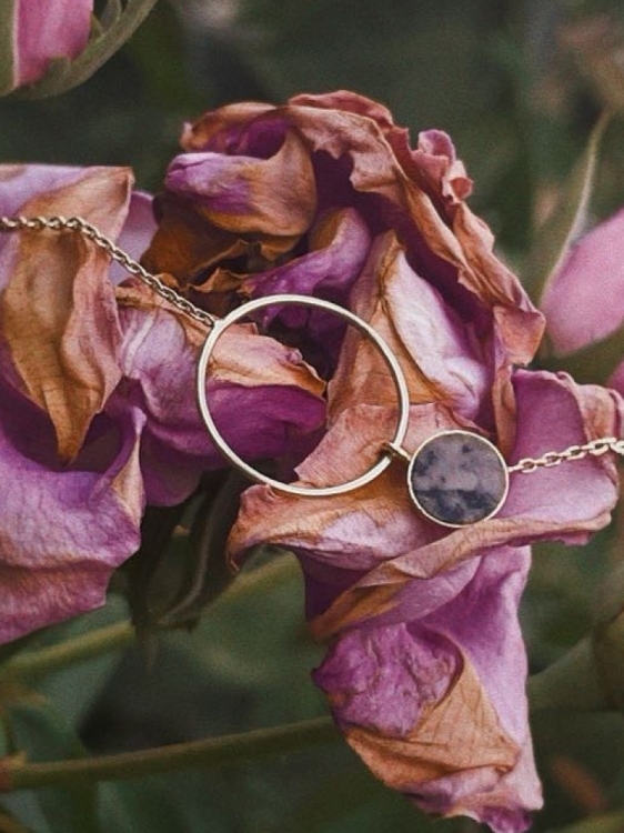 Gold necklace with pink rodingite stone